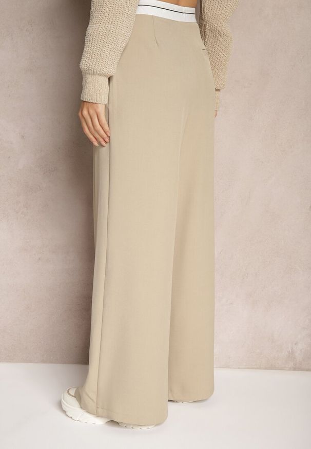 Renee - Beżowe Spodnie z Wiskozy Palazzo High Waist Zapinane na Suwak Nellieva. Okazja: na co dzień. Stan: podwyższony. Kolor: beżowy. Materiał: wiskoza. Styl: casual