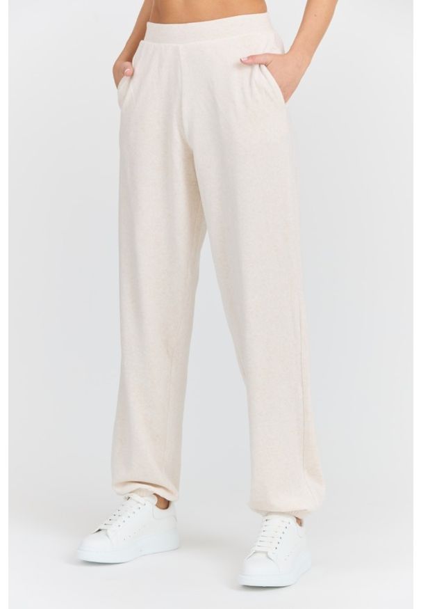 Juicy Couture - JUICY COUTURE Damskie beżowe spodnie dresowe Davidson Gold, Rozmiar XS. Kolor: beżowy. Materiał: dresówka. Długość: długie