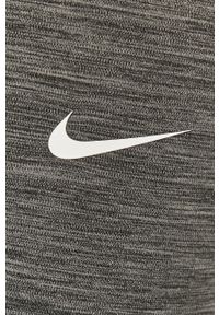 Nike - Legginsy. Kolor: szary. Materiał: tkanina, skóra, dzianina, włókno. Technologia: Dri-Fit (Nike) #3