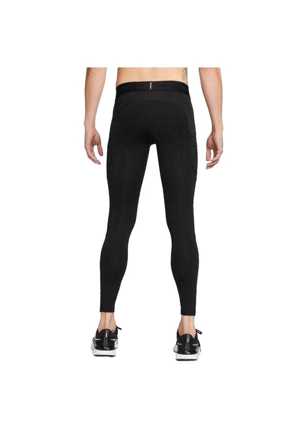 Nike - Męskie Legginsy Pro Warm. Kolor: czarny. Sport: kolarstwo
