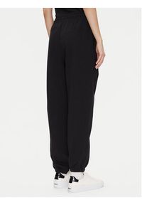 Calvin Klein Jeans Spodnie dresowe Monologo LV047B235G Czarny Regular Fit. Kolor: czarny. Materiał: bawełna #3