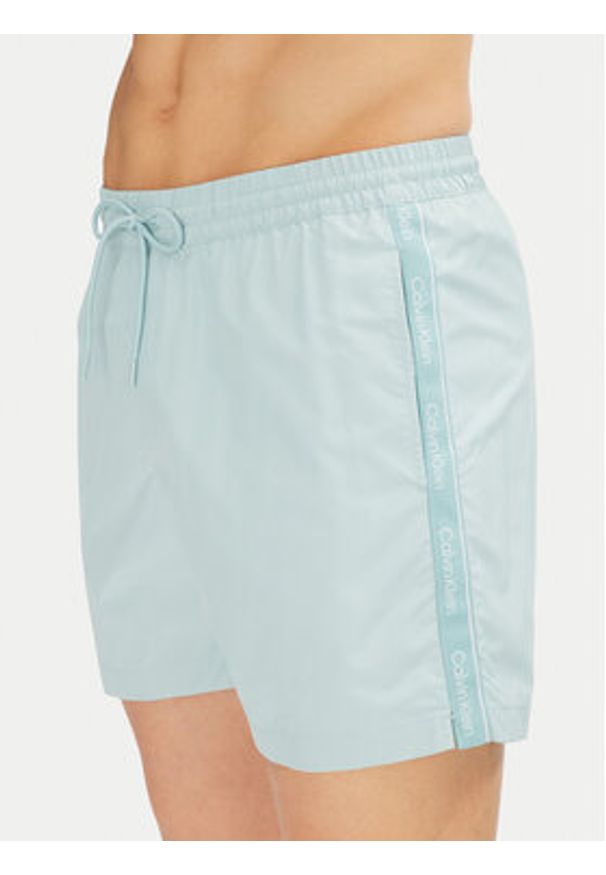 Calvin Klein Swimwear Szorty kąpielowe KM0KM01109 Niebieski Regular Fit. Kolor: niebieski. Materiał: syntetyk