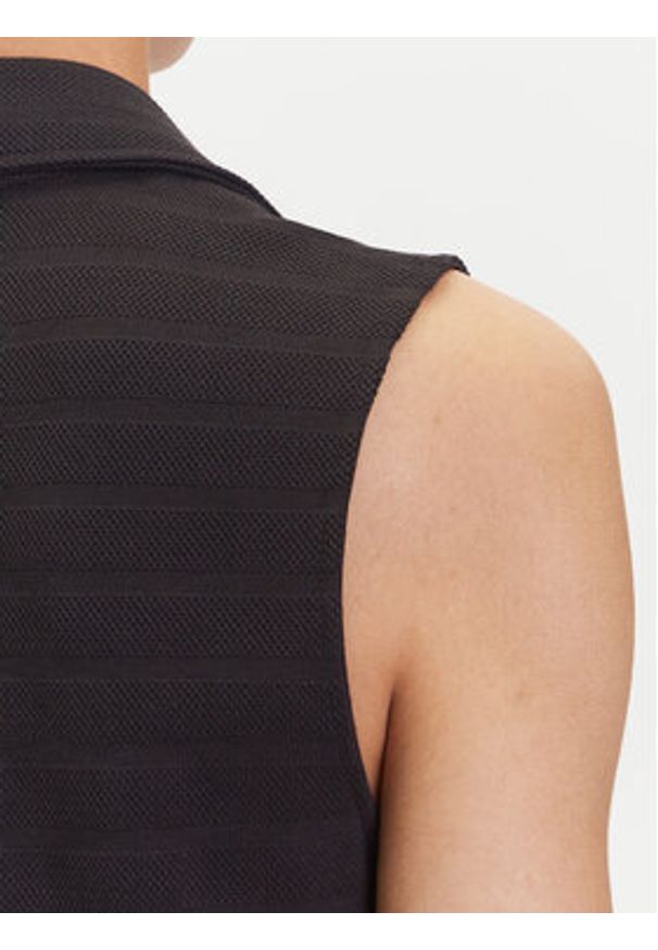 Puma Sukienka codzienna Ess Elevated 685029 Czarny Relaxed Fit. Okazja: na co dzień. Kolor: czarny. Materiał: syntetyk, bawełna. Typ sukienki: proste. Styl: casual