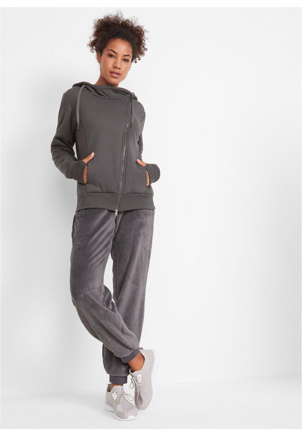 bonprix - Spodnie dresowe z elastyczną gumką w talii. Kolor: szary. Materiał: polar, dresówka. Styl: sportowy