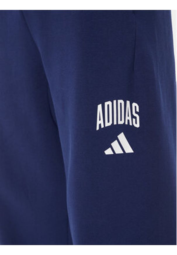 Adidas - adidas Spodnie dresowe Collegiate JM9179 Niebieski Regular Fit. Kolor: niebieski. Materiał: syntetyk, bawełna