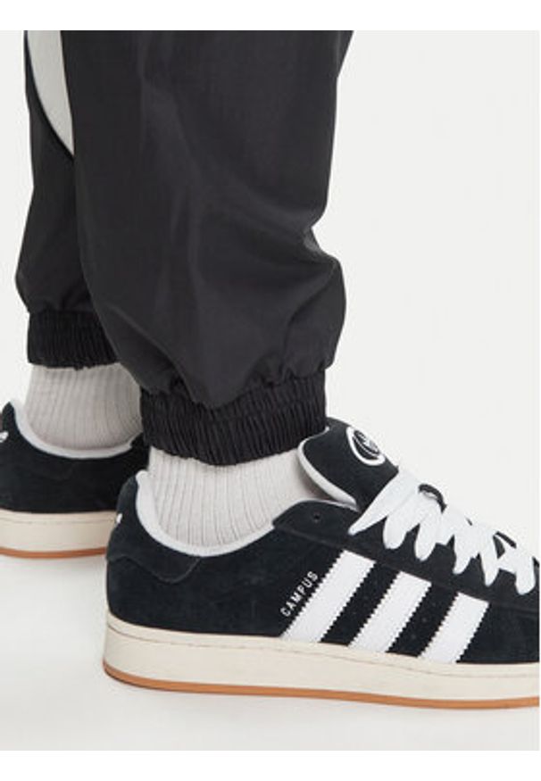Adidas - adidas Spodnie dresowe Stadium JN1830 Czarny Loose Fit. Kolor: czarny. Materiał: syntetyk