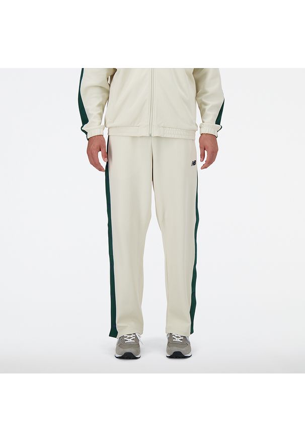 Spodnie męskie New Balance MP41504LIN – beżowe. Kolor: beżowy. Materiał: bawełna, dresówka, tkanina