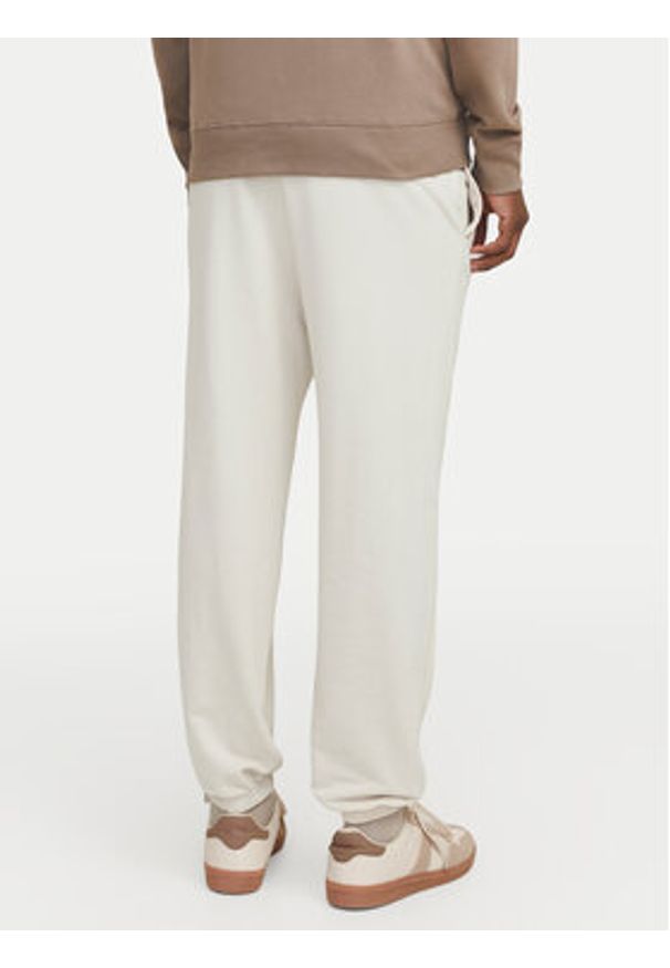 Jack & Jones Spodnie dresowe Morgan 12257964 Beżowy Regular Fit. Kolor: beżowy. Materiał: bawełna, syntetyk