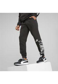 Spodnie Puma Ess Block Camo Sweatpants Tr Cl, Mężczyźni. Kolor: czarny. Materiał: materiał, bawełna