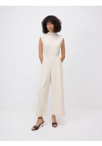 Reserved - Kombinezon z długimi nogawkami - złamana biel. Materiał: dzianina. Wzór: gładki #1