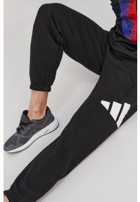 adidas Performance Spodnie GQ6213 męskie kolor czarny z nadrukiem. Kolor: czarny. Materiał: dzianina. Wzór: nadruk #1
