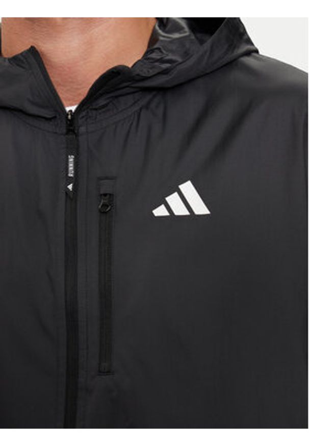 Adidas - adidas Kurtka do biegania Own The Run IN1483 Czarny Slim Fit. Kolor: czarny. Materiał: syntetyk. Sport: bieganie
