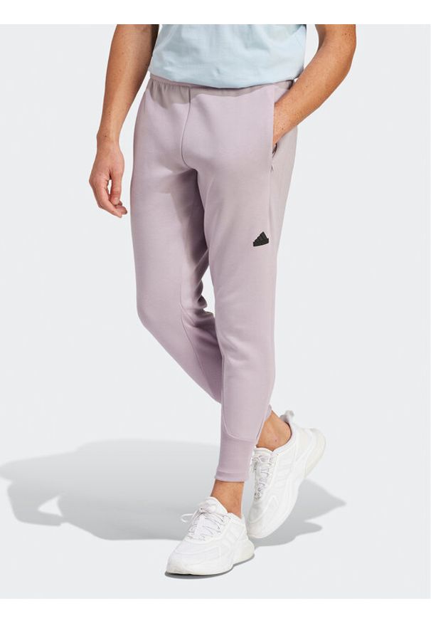 Adidas - adidas Spodnie dresowe Z.N.E. Premium IR5214 Fioletowy Regular Fit. Kolor: fioletowy. Materiał: bawełna