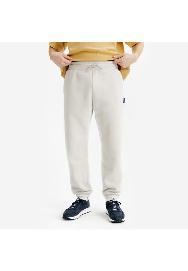 Decathlon - Spodnie męskie Elementals. Kolor: beżowy. Materiał: poliester, bawełna, materiał