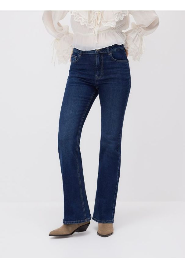 Reserved - Jeansy flare z wysokim stanem - granatowy. Stan: podwyższony. Kolor: niebieski