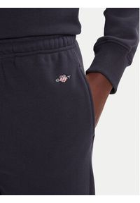 GANT - Gant Spodnie dresowe Shield 4200500 Granatowy Regular Fit. Kolor: niebieski. Materiał: bawełna #3