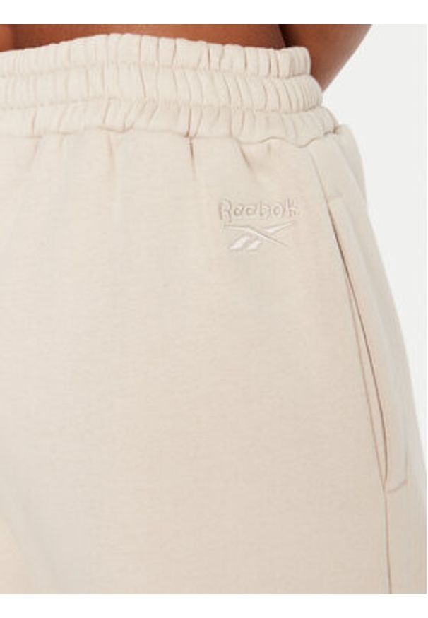 Reebok Spodnie dresowe Reebok X Ewa Chodakowska RK25304CCW Beżowy Regular Fit. Kolor: beżowy. Materiał: bawełna