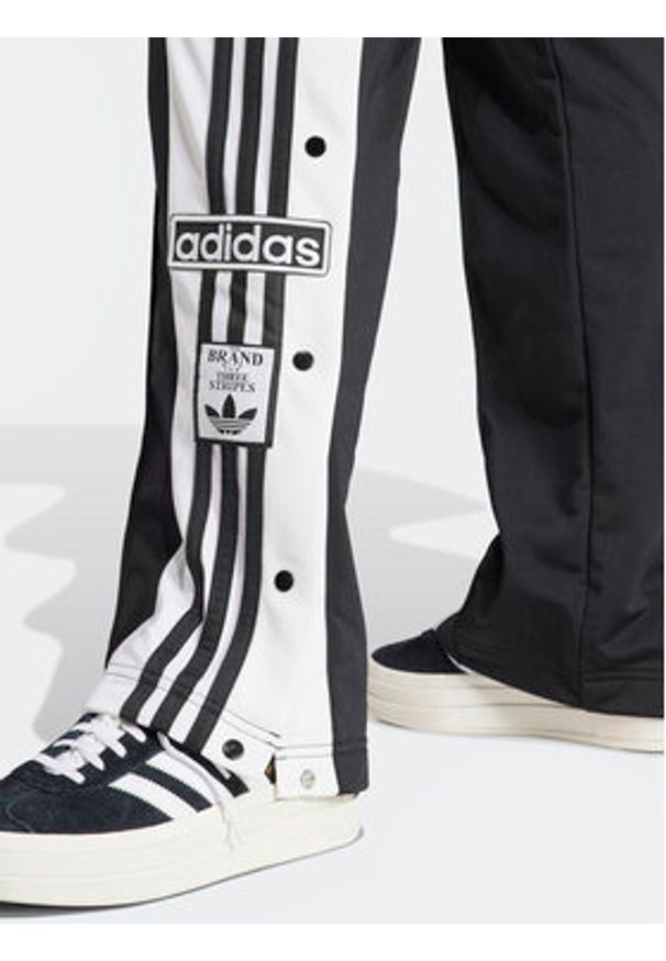 Adidas - adidas Spodnie dresowe Adibreak IU2519 Czarny Regular Fit. Kolor: czarny. Materiał: syntetyk