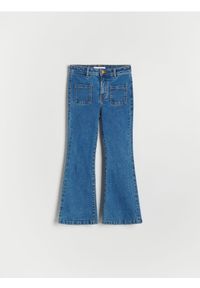 Reserved - Jeansy extra bootcut - niebieski. Kolor: niebieski