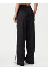 Adidas - adidas Spodnie dresowe Satin Sst KS9372 Czarny Loose Fit. Kolor: czarny. Materiał: syntetyk #2