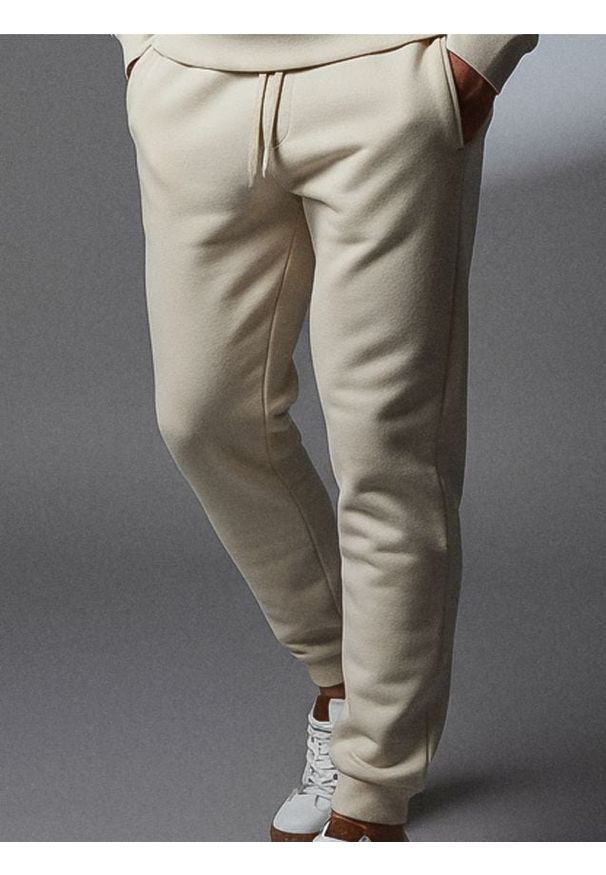 Sinsay - Spodnie dresowe jogger - kremowy. Kolor: kremowy. Materiał: dresówka