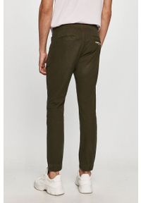 Tommy Jeans - Spodnie. Kolor: oliwkowy. Materiał: tkanina, bawełna, elastan. Wzór: gładki #3