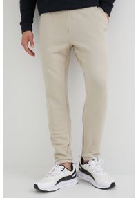 4f - 4F spodnie dresowe męskie kolor beżowy gładkie. Kolor: beżowy. Materiał: dresówka. Wzór: gładki