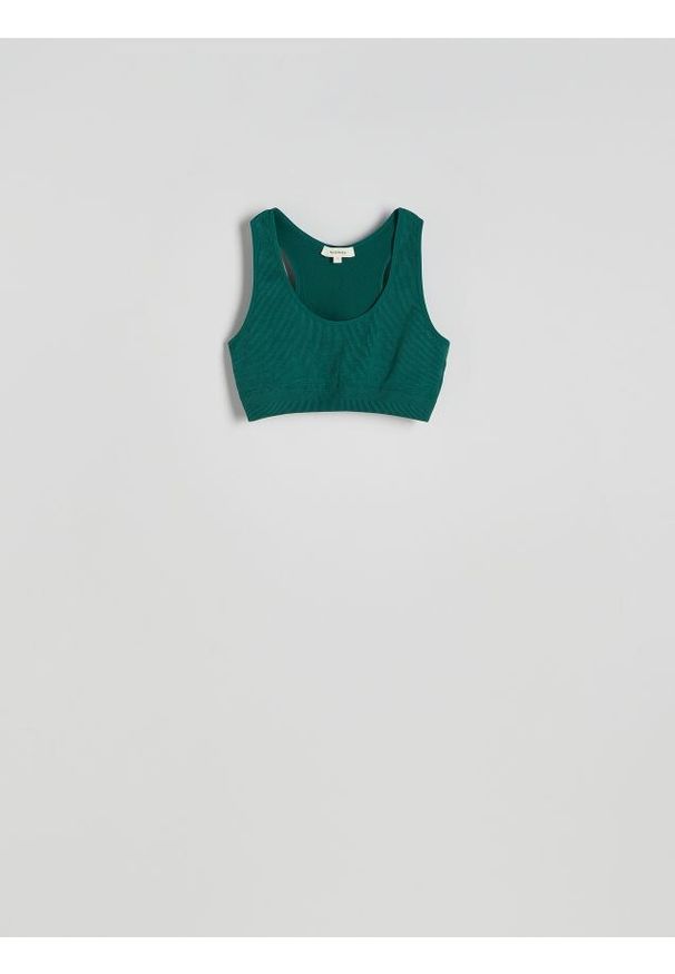 Reserved - Bezszwowy top w stylu sportowym - morski. Kolor: morski. Materiał: prążkowany, dzianina. Długość: krótkie. Styl: sportowy