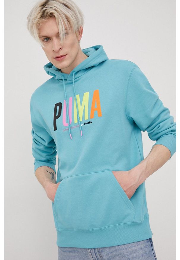 Puma bluza bawełniana 533621 męska kolor turkusowy z kapturem z aplikacją. Typ kołnierza: kaptur. Kolor: turkusowy. Materiał: bawełna. Wzór: aplikacja