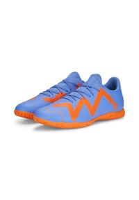 Buty piłkarskie męskie Puma Future Play IT. Zapięcie: sznurówki. Kolor: wielokolorowy, pomarańczowy, żółty, biały, niebieski. Materiał: materiał, syntetyk. Szerokość cholewki: normalna. Sport: piłka nożna