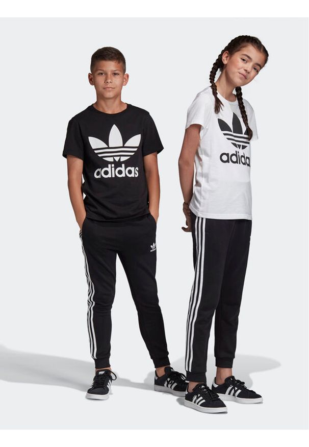 Adidas - adidas Spodnie dresowe Trefoil 3-Stripes DV2872 Czarny Regular Fit. Kolor: czarny. Materiał: syntetyk