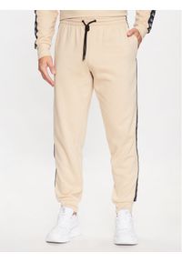 Kappa Spodnie dresowe 313014 Beżowy Regular Fit. Kolor: beżowy. Materiał: bawełna