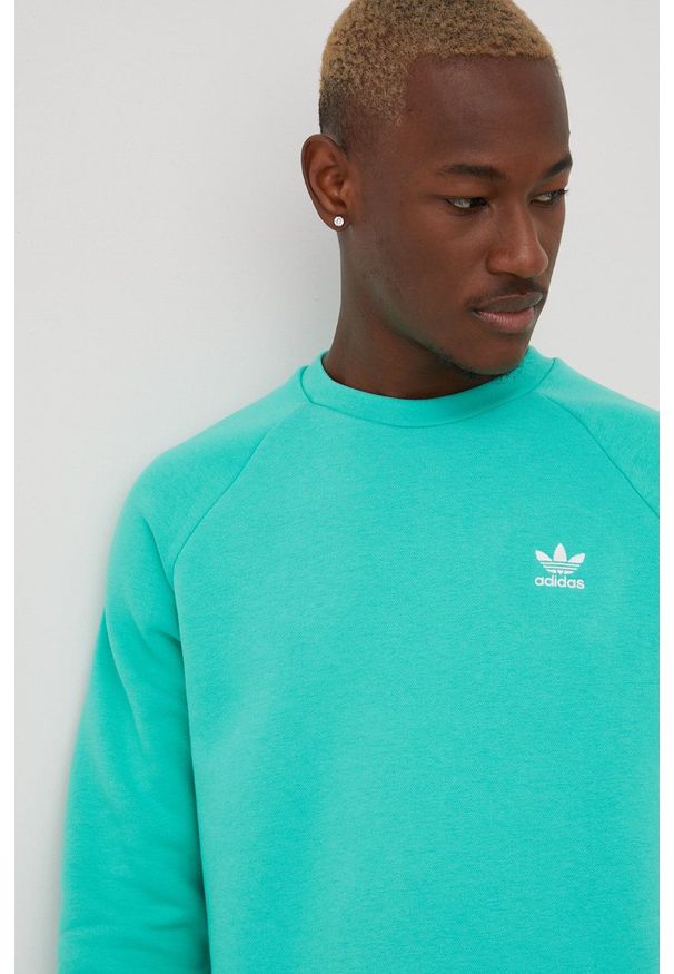 adidas Originals bluza Adicolor HE9425 męska kolor zielony gładka. Okazja: na co dzień. Kolor: zielony. Materiał: bawełna. Długość rękawa: raglanowy rękaw. Wzór: gładki. Styl: casual