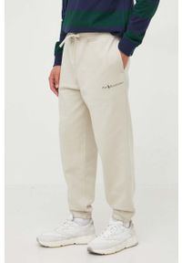 Polo Ralph Lauren spodnie męskie kolor beżowy z nadrukiem. Kolor: beżowy. Materiał: poliester. Wzór: nadruk #1