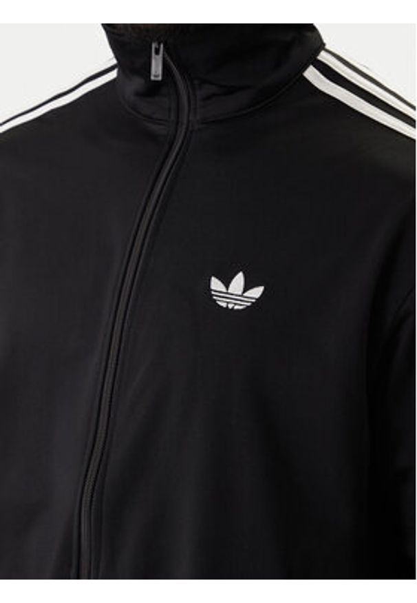 Adidas - adidas Bluza Firebird KD8312 Czarny Loose Fit. Kolor: czarny. Materiał: syntetyk