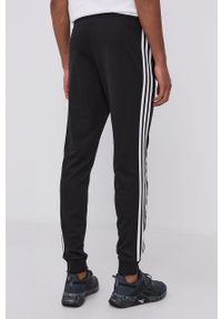 Adidas - adidas Spodnie GK8831 męskie kolor czarny gładkie. Kolor: czarny. Materiał: poliester, dzianina. Wzór: gładki #3