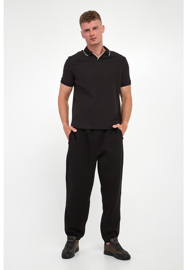 Armani Exchange - Spodnie dresowe męskie ARMANI EXCHANGE. Materiał: dresówka