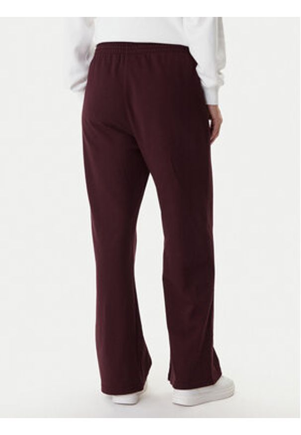 TOMMY HILFIGER - Tommy Hilfiger Spodnie dresowe UW0UW06081 Bordowy Wide Leg. Kolor: czerwony. Materiał: bawełna