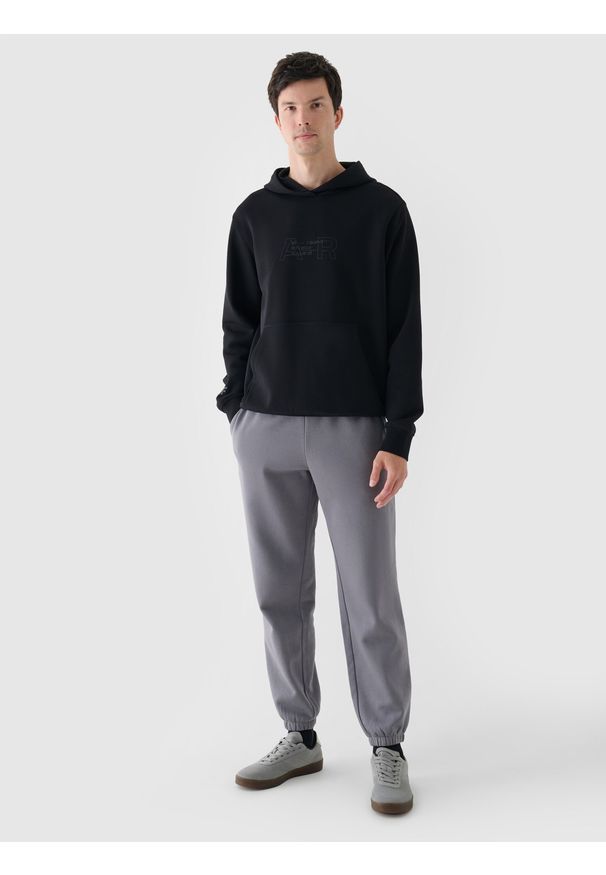 4f - 4F Bluza dresowa nierozpinana z kapturem męska - czarna XXL. Okazja: na co dzień. Typ kołnierza: kaptur. Kolor: czarny. Materiał: dresówka. Wzór: gładki, ze splotem, nadruk. Styl: sportowy, casual