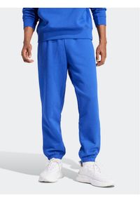 Adidas - adidas Spodnie dresowe ALL SZN IW1186 Niebieski Regular Fit. Kolor: niebieski. Materiał: bawełna #1
