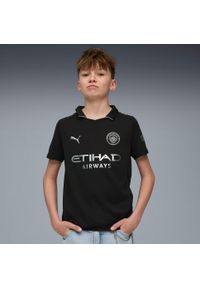Puma - Koszulka wyjazdowa dziecięca Manchester City 2025/26. Kolor: czarny. Sport: piłka nożna