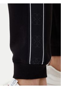 Guess Spodnie dresowe Mickey Z2YB09 KB3P2 Czarny Regular Fit. Kolor: czarny. Materiał: bawełna #2
