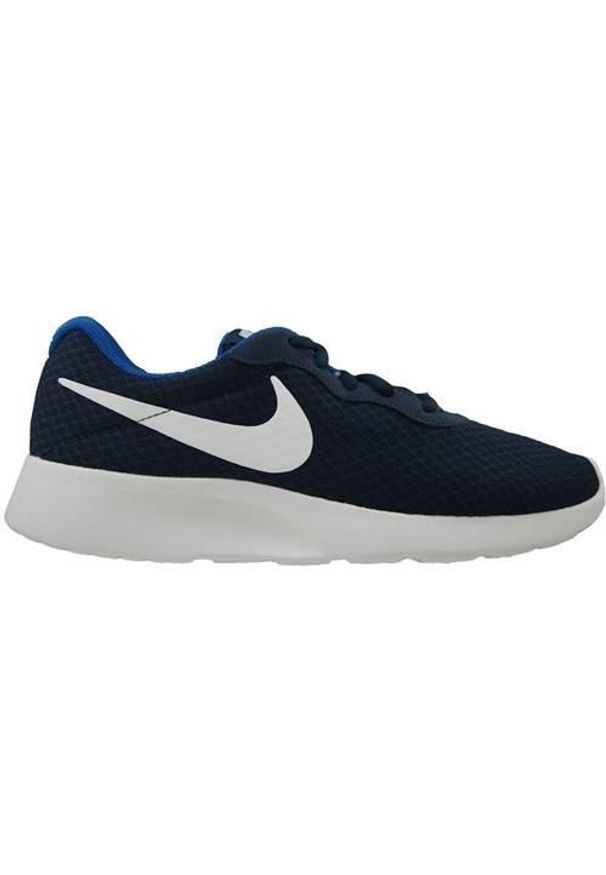 Buty do chodzenia damskie Nike Tanjun. Zapięcie: sznurówki. Kolor: niebieski. Materiał: materiał, syntetyk, tkanina. Szerokość cholewki: normalna. Model: Nike Tanjun. Sport: turystyka piesza
