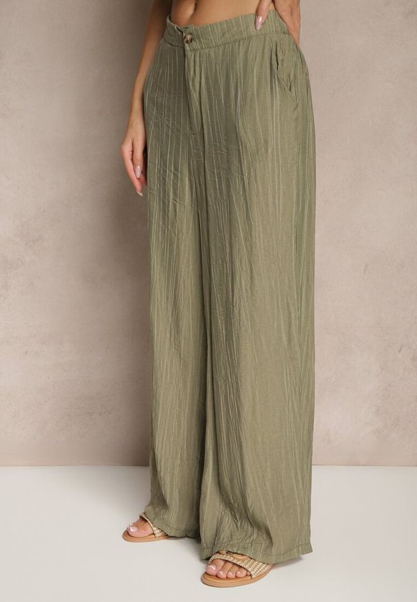 Renee - Ciemnozielone Spodnie o Szerokim Kroju High Waist Natoreia. Okazja: na co dzień. Stan: podwyższony. Kolor: zielony. Styl: boho, klasyczny, elegancki, casual