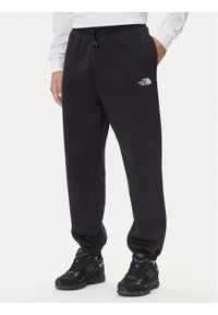The North Face Spodnie dresowe Essential NF0A8C1F Czarny Relaxed Fit. Kolor: czarny. Materiał: bawełna