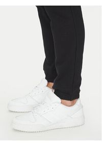 Adidas - adidas Spodnie dresowe Trefoil Essentials JD2422 Czarny Slim Fit. Kolor: czarny. Materiał: bawełna #4