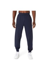 Spodnie do biegania Asics Court Warm-Up. Kolor: niebieski, wielokolorowy #2