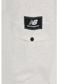New Balance Spodnie MP13503SAH męskie kolor szary gładkie. Kolor: szary. Materiał: dzianina. Wzór: gładki #3