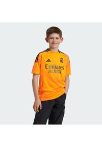 Adidas - Koszulka Real Madrid 24/25 Away Kids. Kolor: pomarańczowy. Materiał: materiał #1