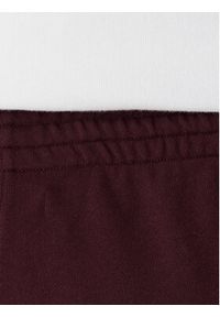 TOMMY HILFIGER - Tommy Hilfiger Spodnie dresowe UW0UW06081 Bordowy Wide Leg. Kolor: czerwony. Materiał: bawełna #4